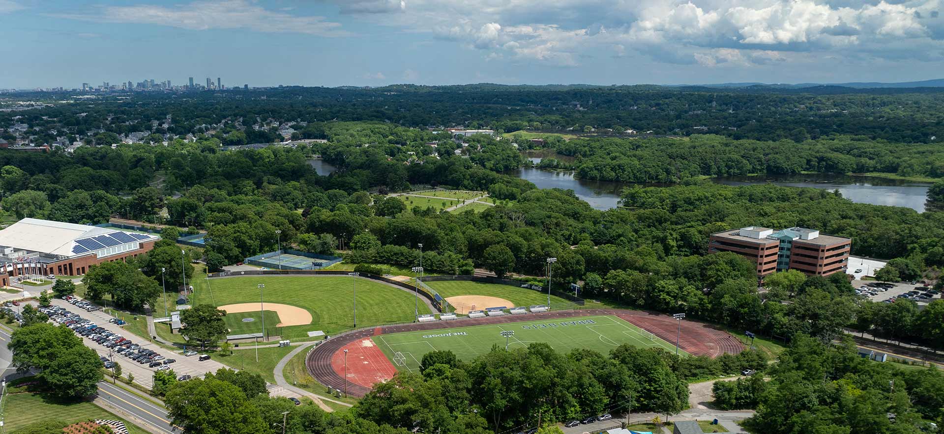 An aerial view of the Brandeis campus in the summer.