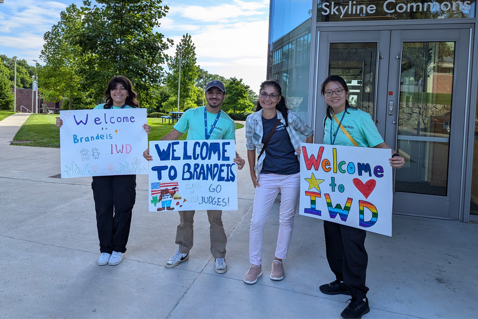 IREPs holding welcome signs